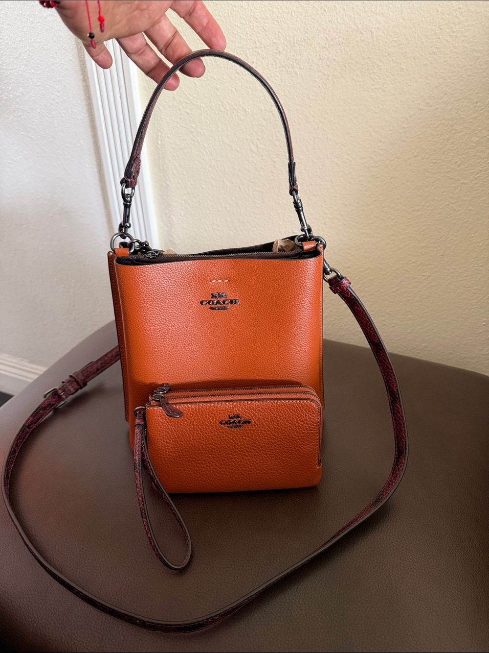 Coach Orange Pebbled Leather Bucket Bag with Detachable Zip Pouch